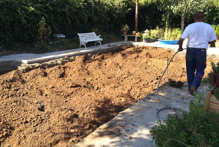 Contractor removing a pool